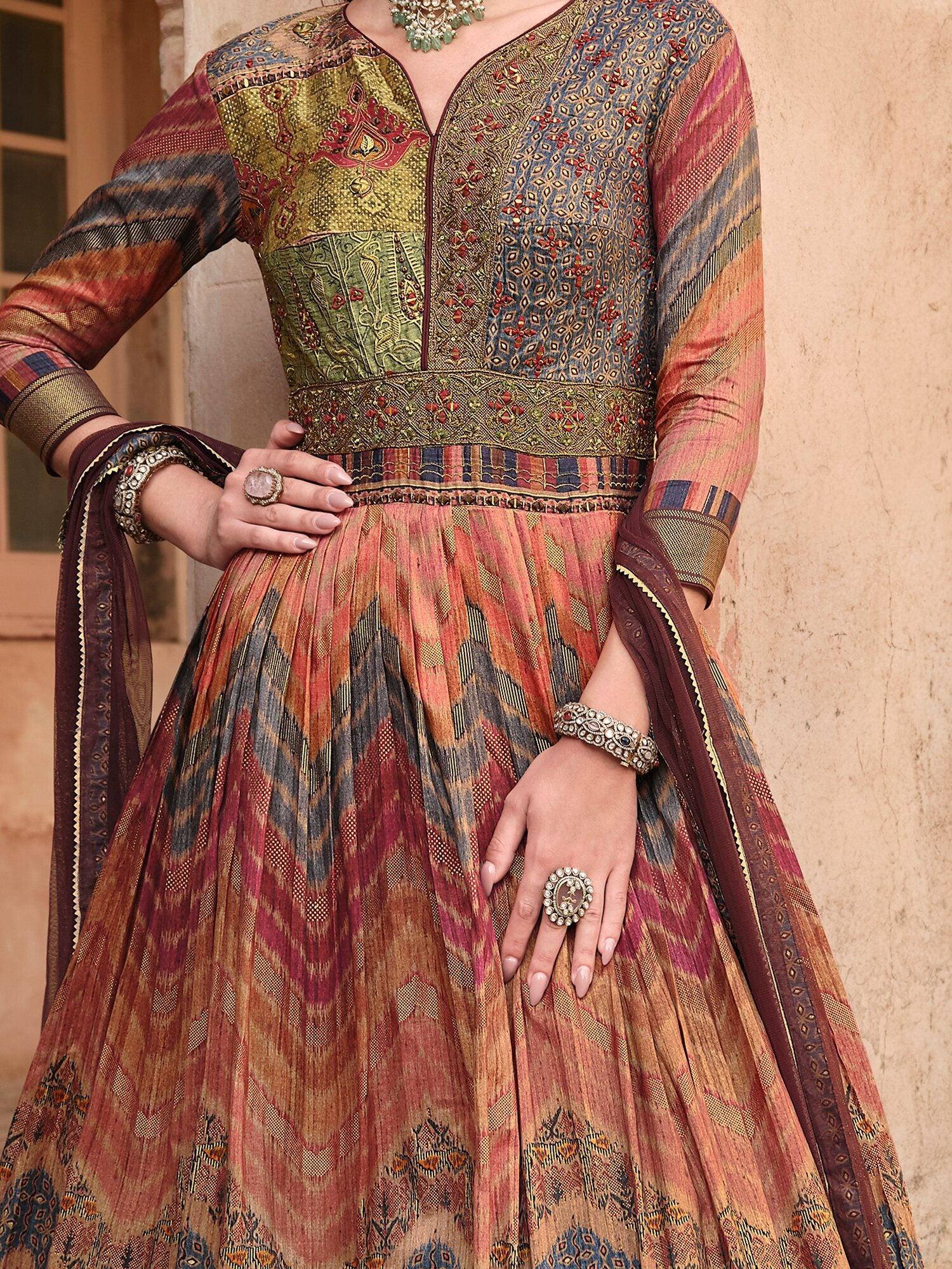 Designer Indian ethnic anarkali suit with intricate embroidery and vibrant ikat print, perfect for festive occasions.