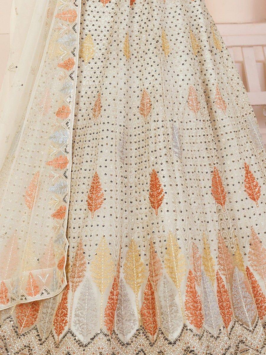 Elegant ivory lehenga with orange and gold leaf embroidery, sequin detailing, perfect for Indian ethnic wear