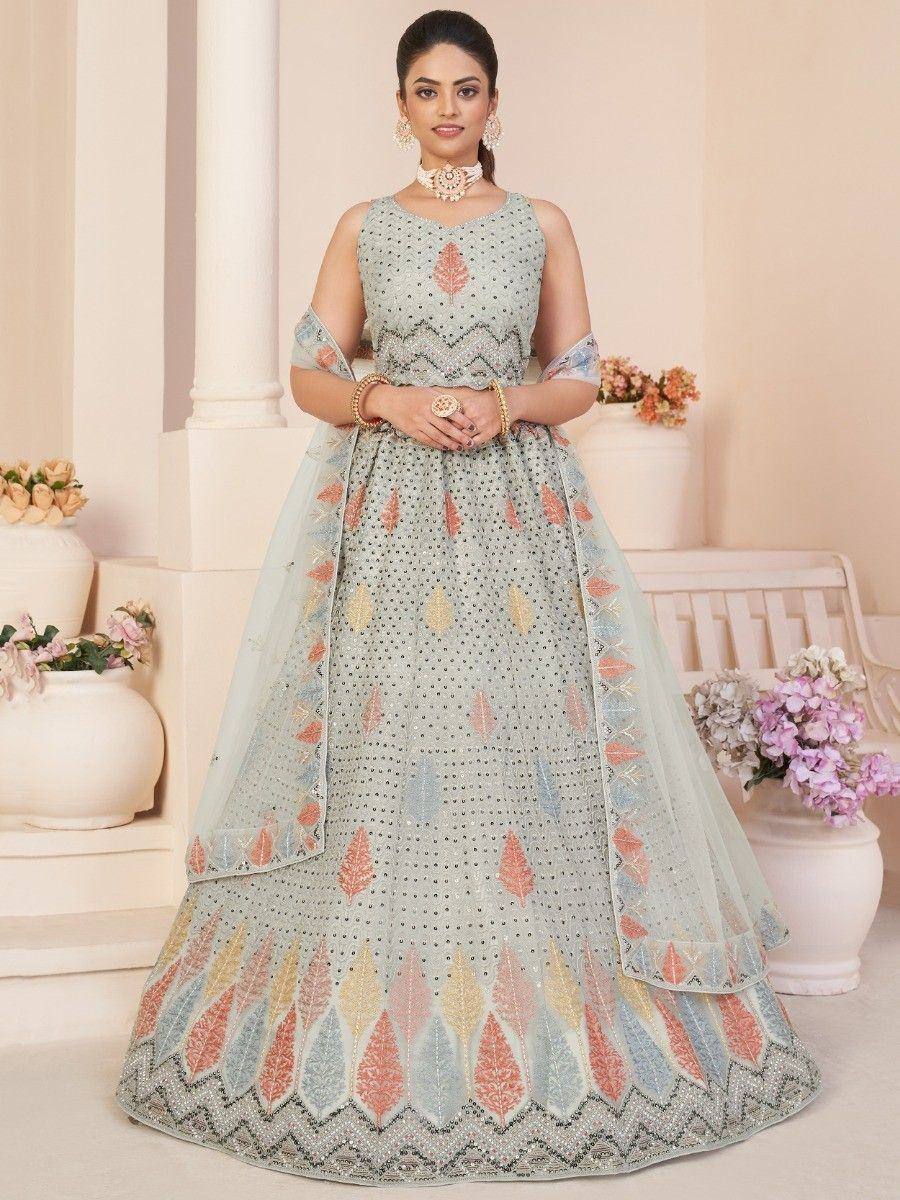 Elegant light blue lehenga choli with floral embroidery, perfect for Indian weddings and festive occasions.