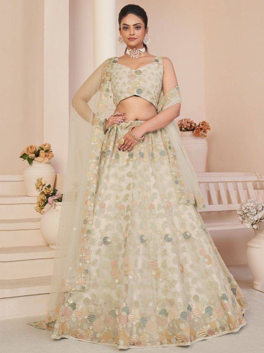 Elegant pastel lehenga choli with floral embroidery, perfect for weddings and festive occasions