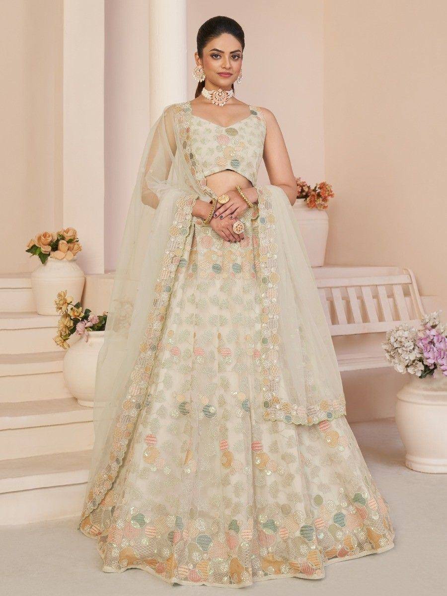 Elegant pastel lehenga choli with floral embroidery, perfect for Indian weddings and festive occasions