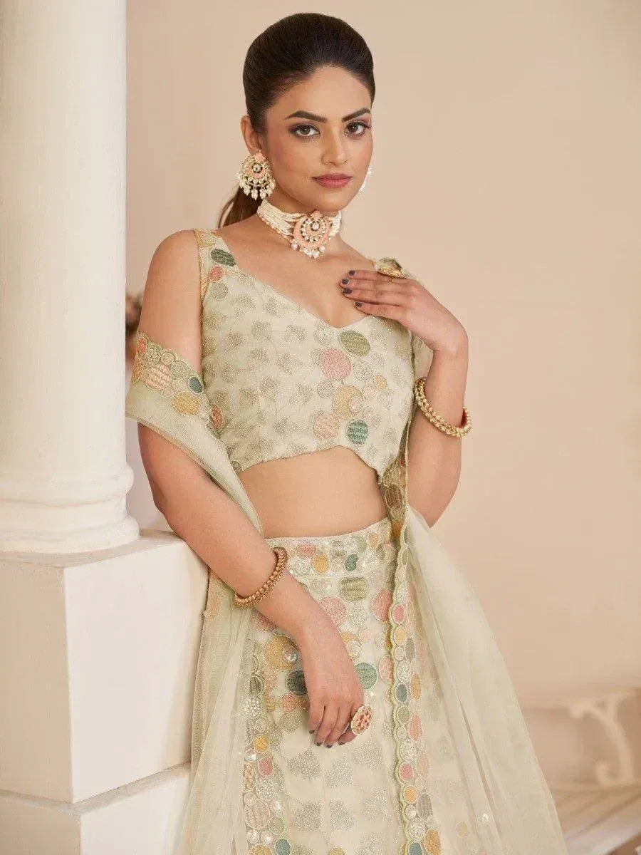 Elegant pastel lehenga choli with floral embroidery, perfect for Indian ethnic wear occasions