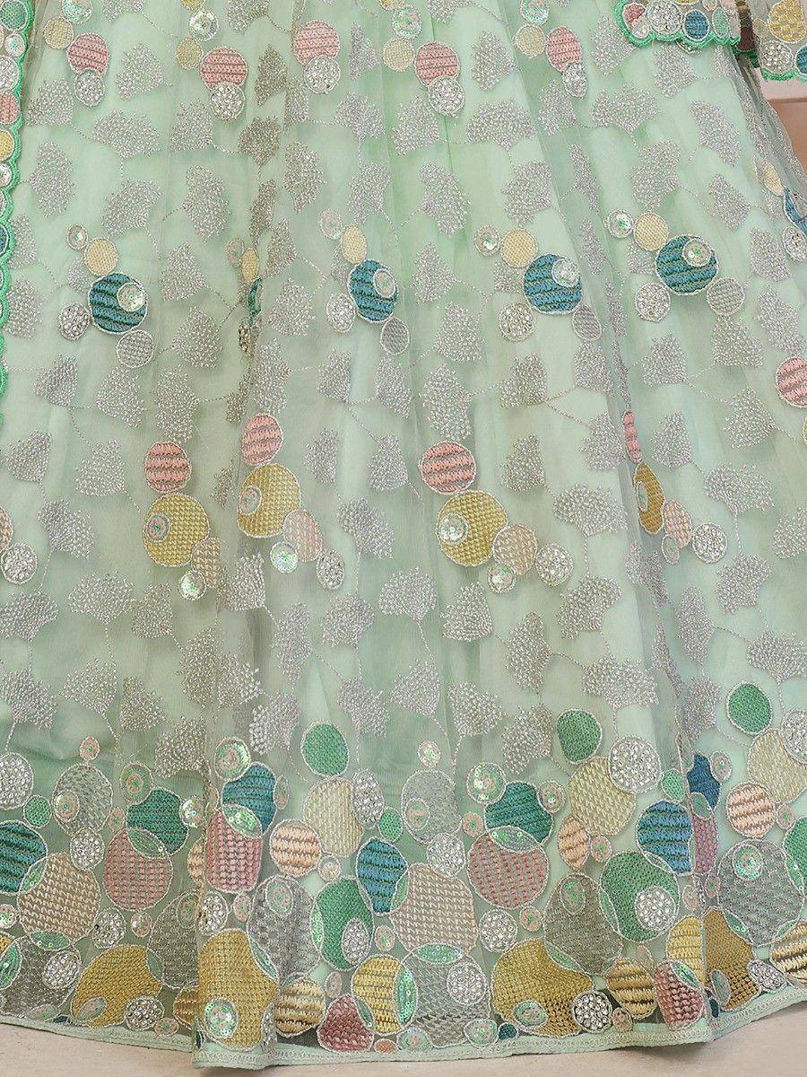 Mint green lehenga with colorful circular embroidery and sequin detailing for ethnic wear