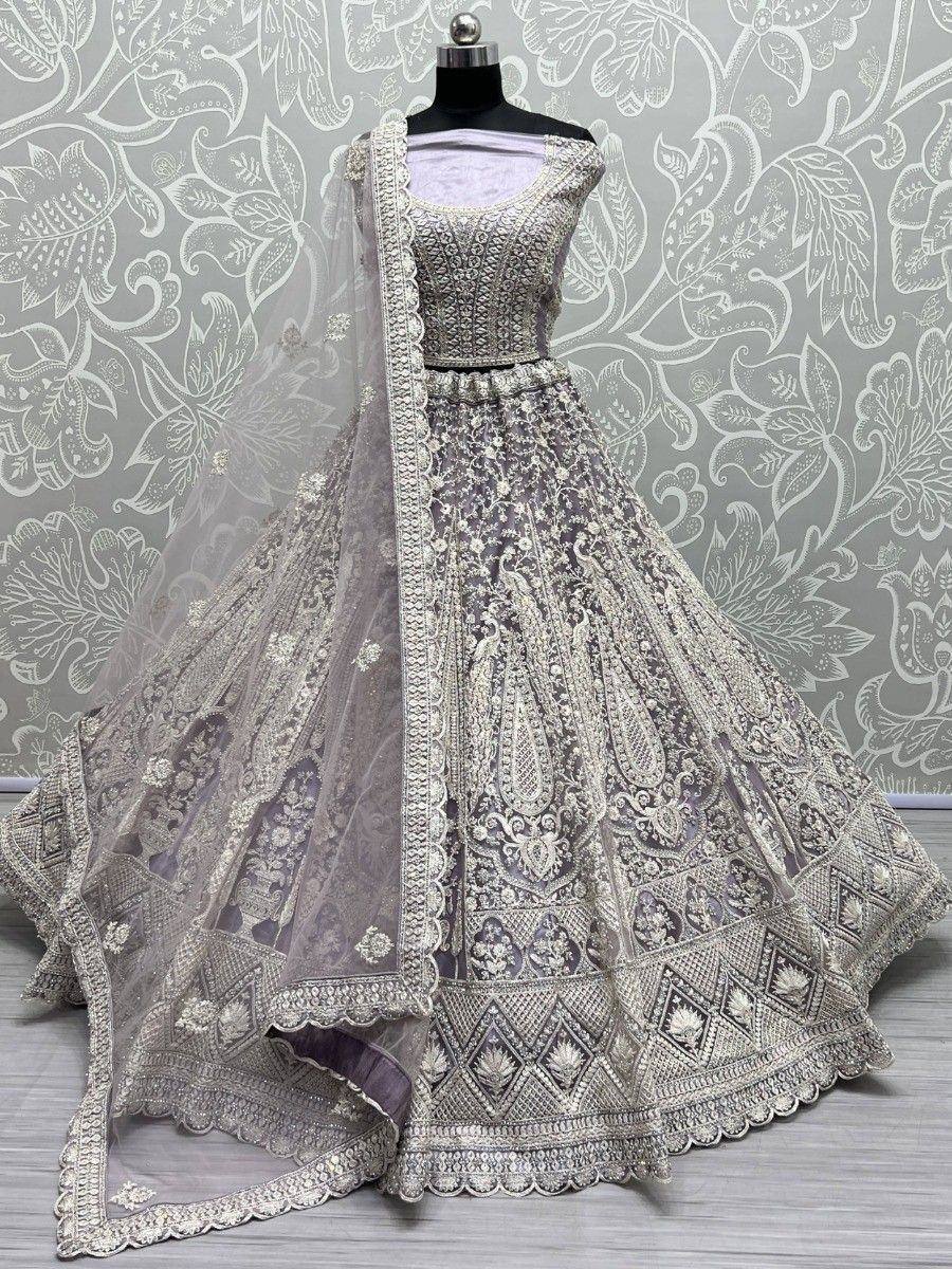 Elegant silver grey lehenga choli with intricate embroidery and matching dupatta, perfect for Indian weddings.
