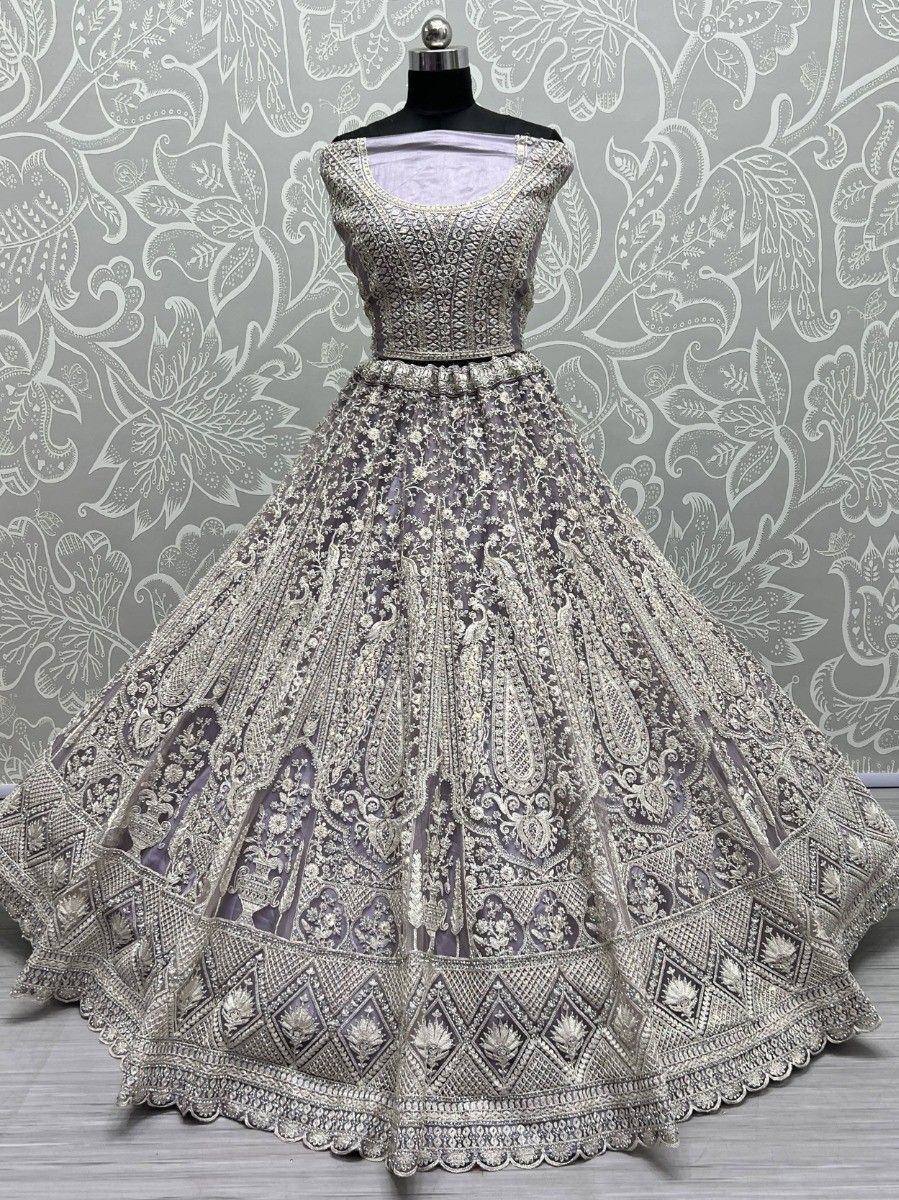 Elegant silver and lavender designer lehenga choli with intricate embroidery, perfect for weddings and festive occasions.