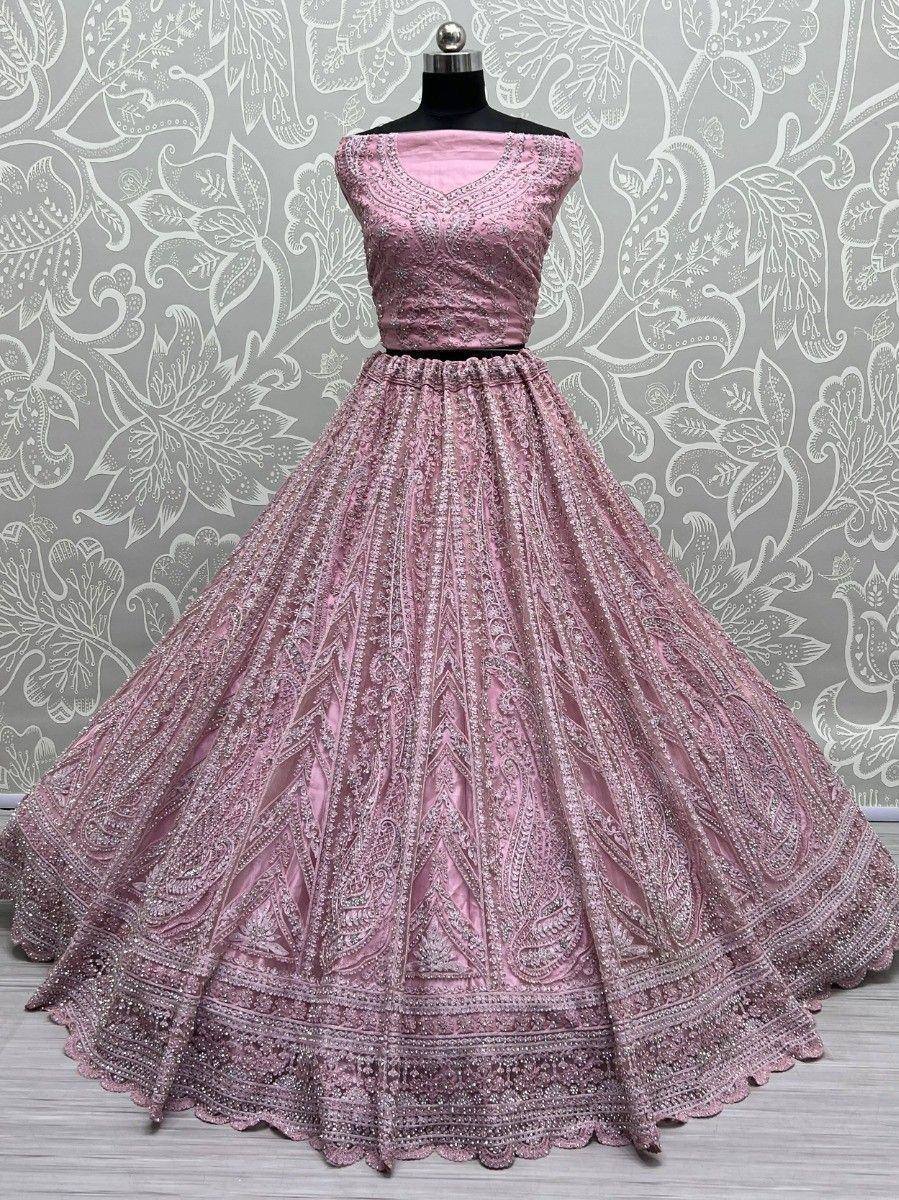 Pink embroidered lehenga choli with intricate beadwork, perfect for Indian ethnic wear and festive occasions.