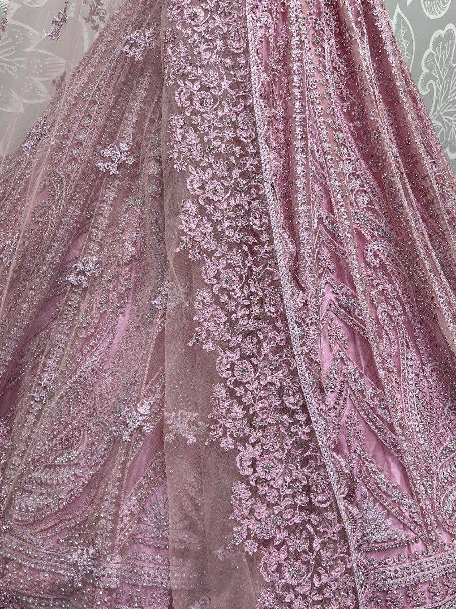 Pink designer lehenga with intricate floral embroidery and beadwork, perfect for Indian ethnic wear