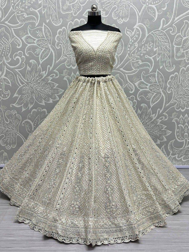 Captivating Cream Thread Work Net Reception Wear Lehenga Choli