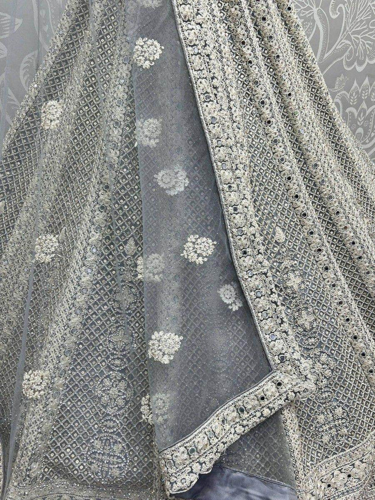 Charming Grey Embroidered Net Engagement Wear Lehenga Choli