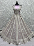 Fascinating Lavender Embroidered Net Lehenga Choli With Dupatta