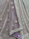 Fascinating Lavender Embroidered Net Lehenga Choli With Dupatta