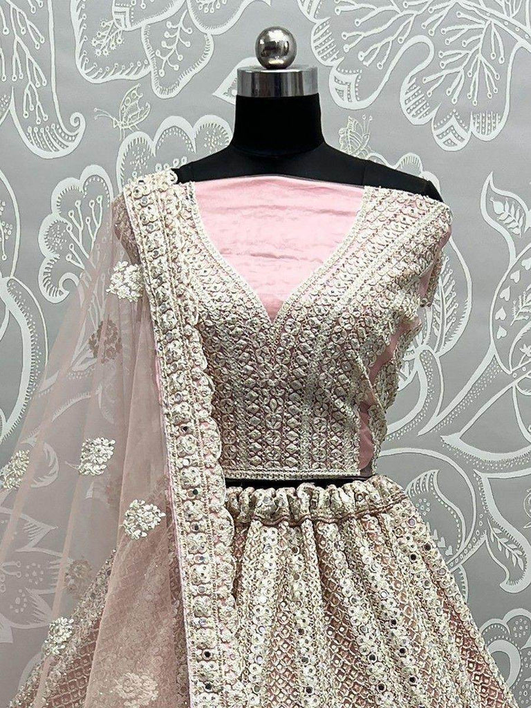 Glamorous Pink Embroidered Net Engagement Lehenga Choli