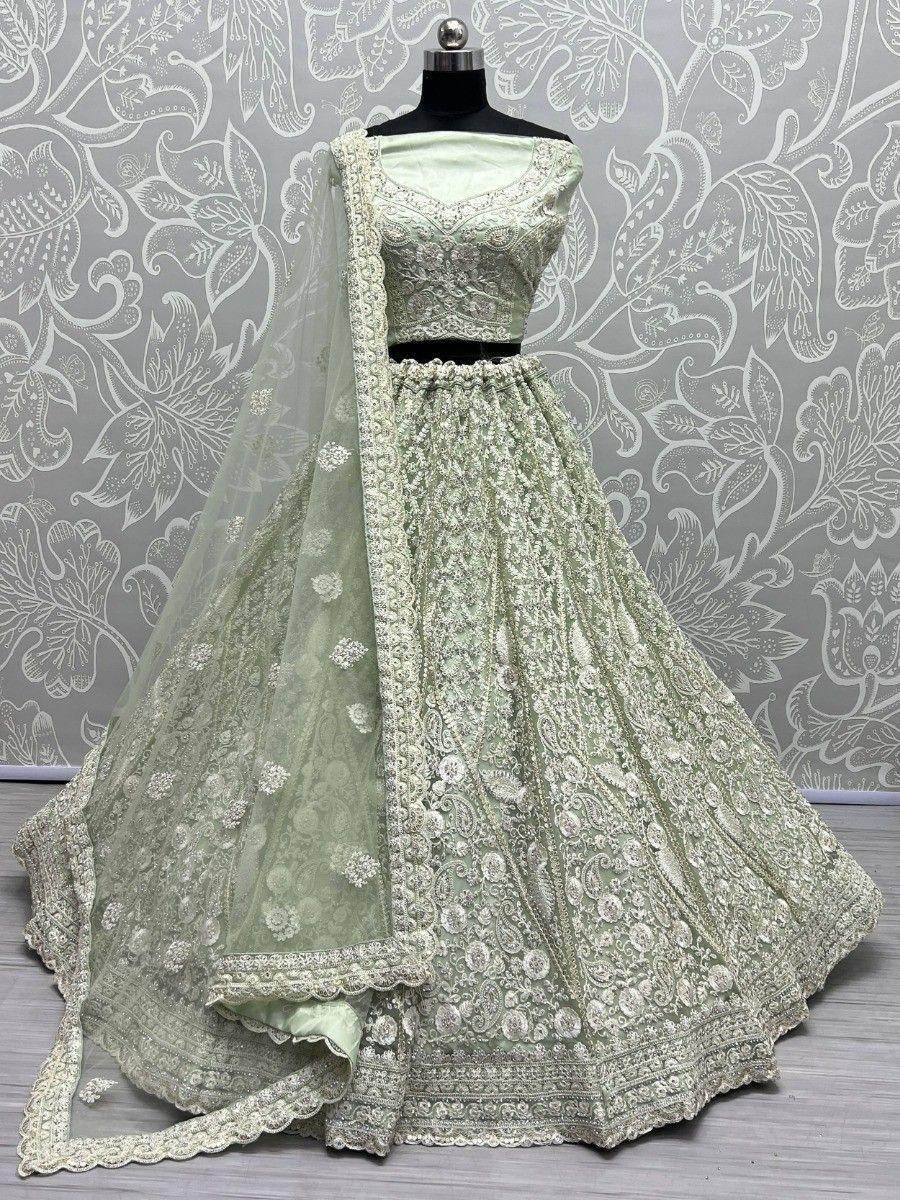 Beautiful Pista Green Embroidered Net Reception Wear Lehenga Choli