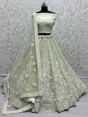 Beautiful Pista Green Embroidered Net Reception Wear Lehenga Choli