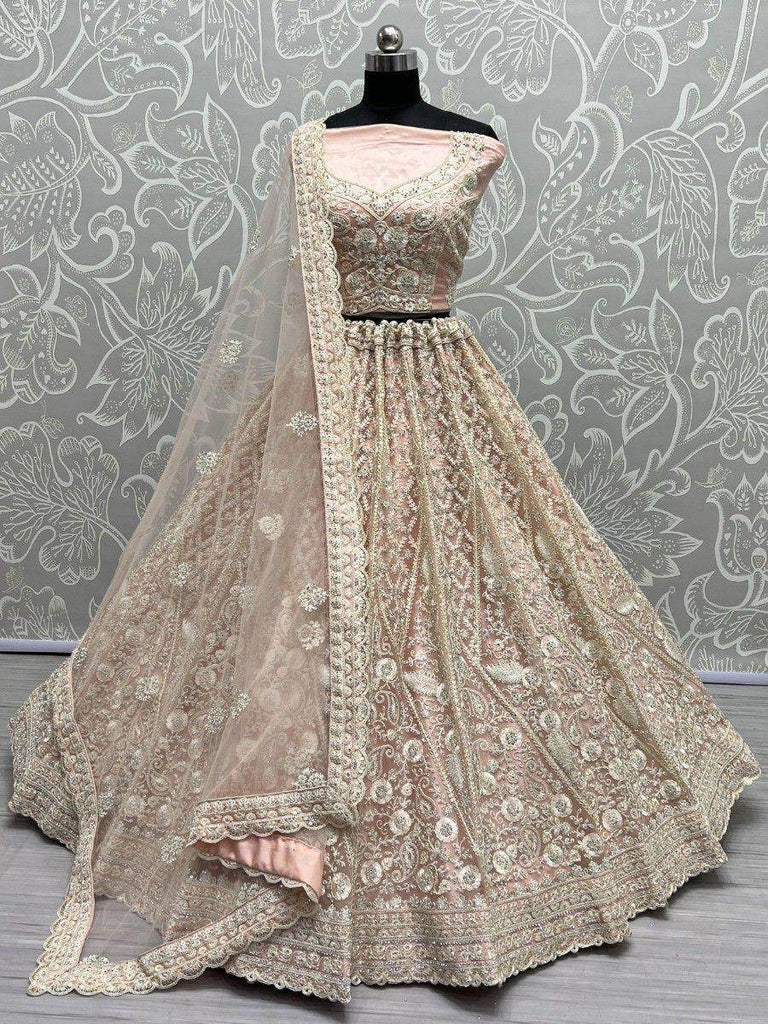 Charming Peach Thread Work Net Engagement Wear Lehenga Choli