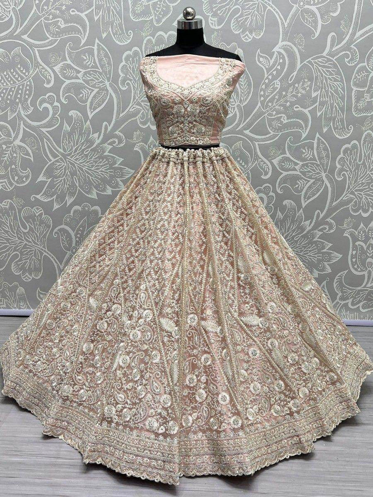 Charming Peach Thread Work Net Engagement Wear Lehenga Choli