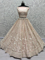 Charming Peach Thread Work Net Engagement Wear Lehenga Choli