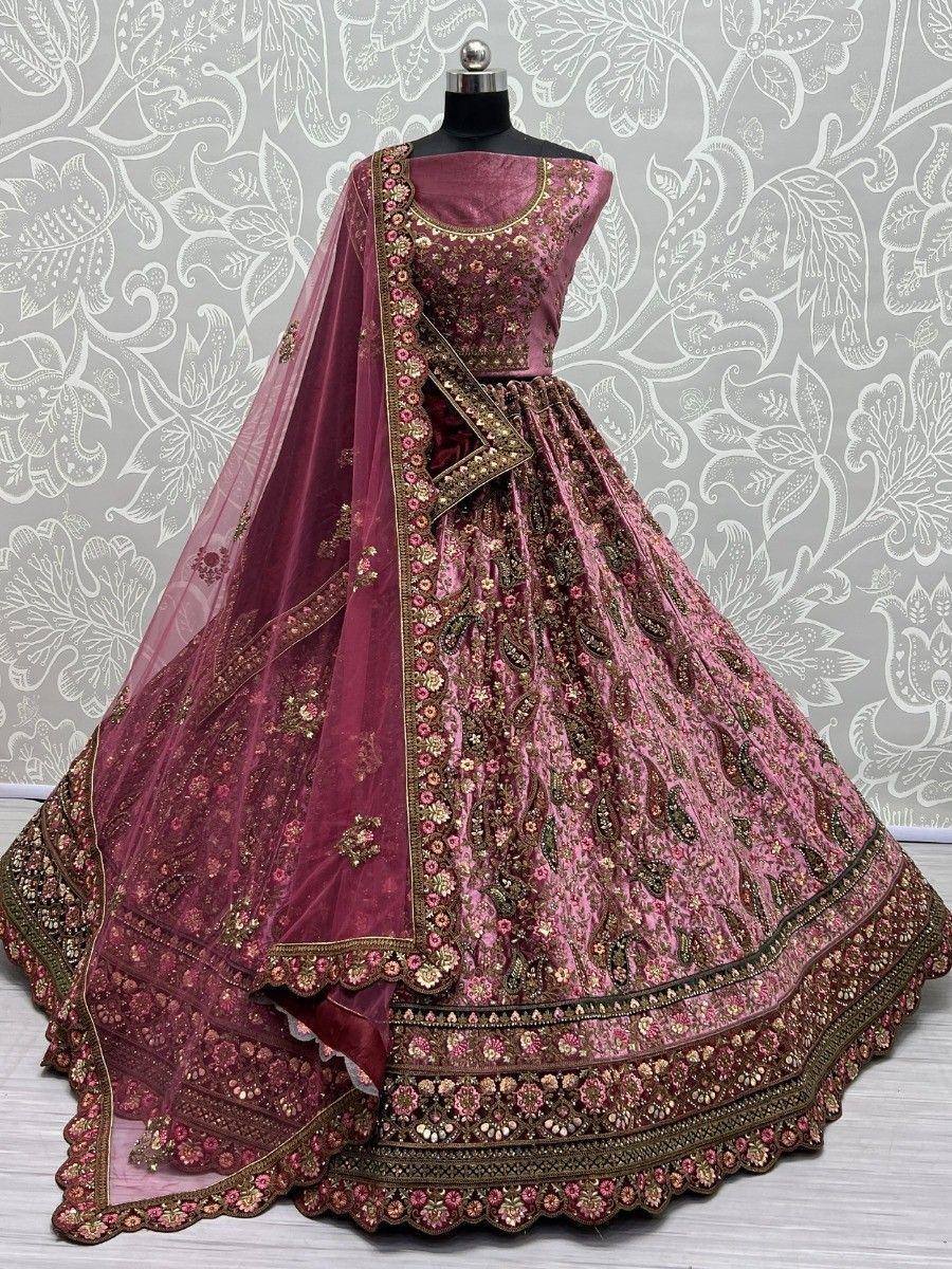 Elegant maroon lehenga choli with intricate floral embroidery and matching dupatta, perfect for Indian weddings and festive occasions.