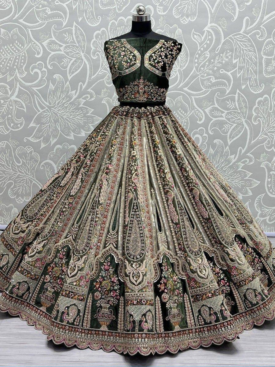 Dark green designer lehenga choli with heavy floral embroidery and scalloped hem, perfect for weddings