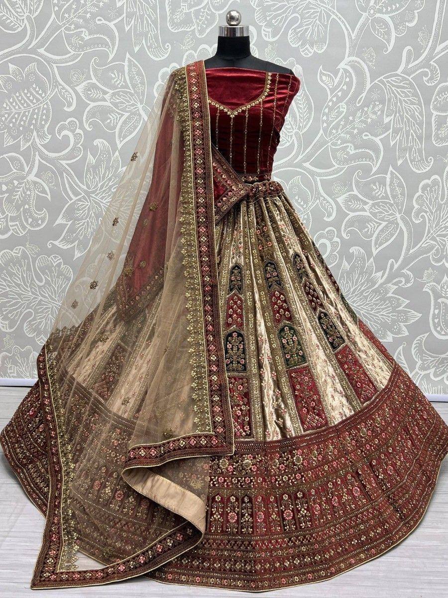 Maroon velvet designer lehenga choli with gold embroidery and sheer dupatta, ethnic Indian wear
