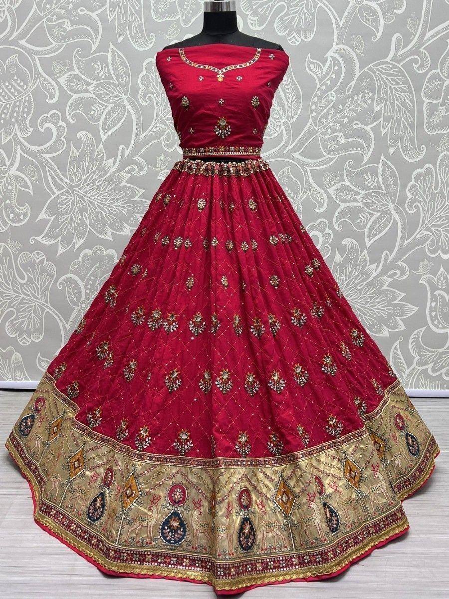 Red designer lehenga choli with gold embroidery and floral motifs, perfect for Indian ethnic wear occasions