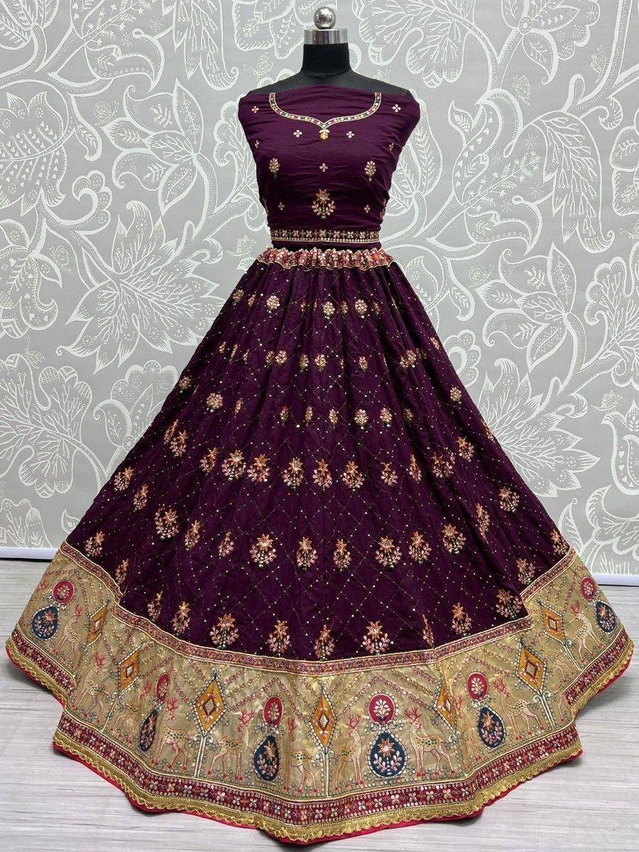 Purple designer lehenga choli with gold embroidery and floral border, perfect for Indian ethnic wear