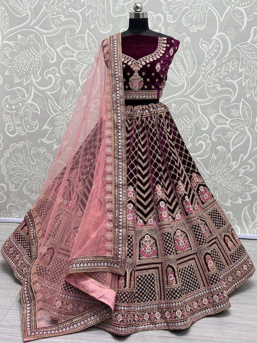 Purple velvet designer lehenga choli with pink dupatta, intricate embroidery, perfect for weddings