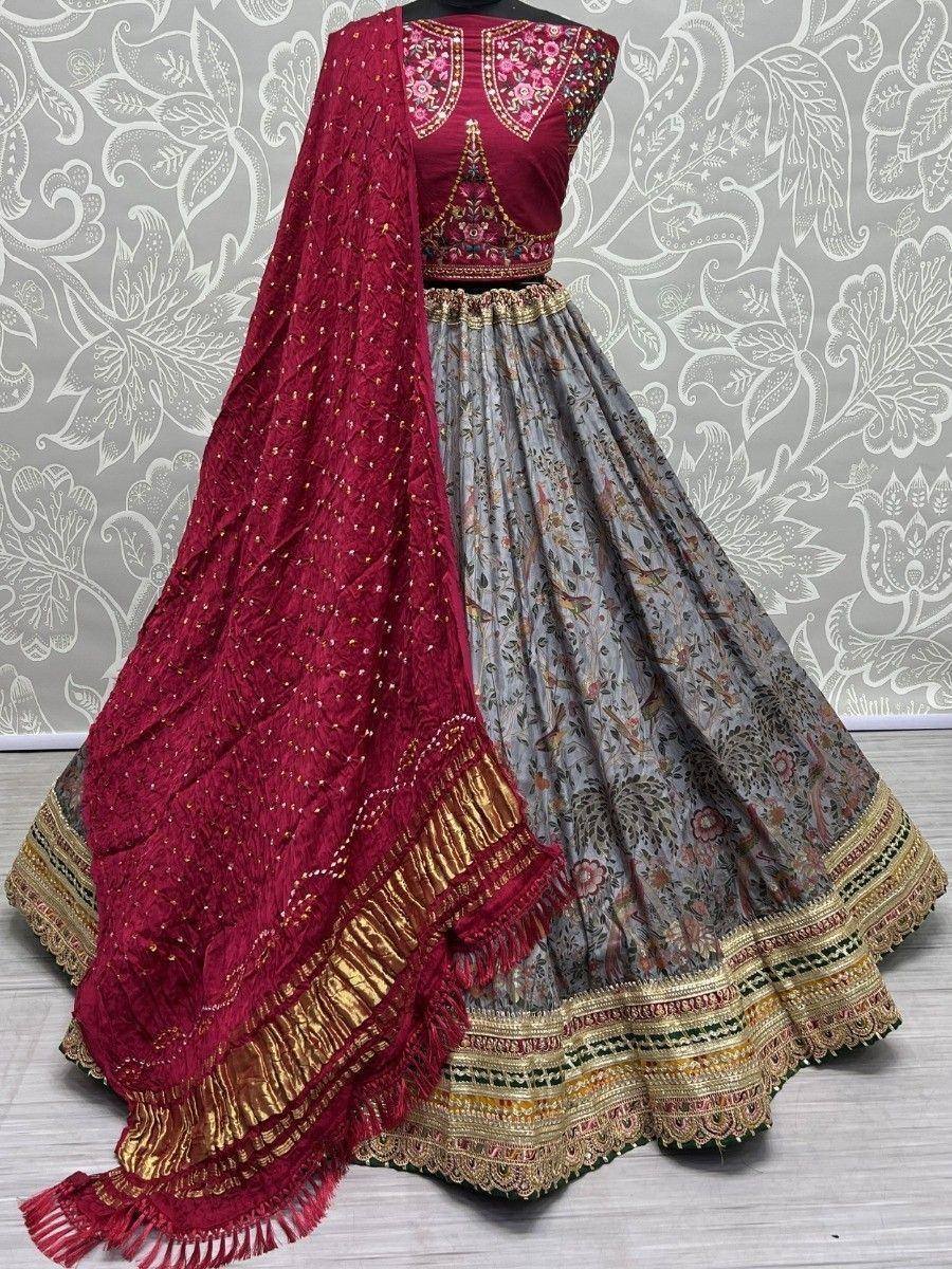 Maroon embroidered lehenga choli with floral grey skirt and gold trim, perfect for Indian ethnic occasions