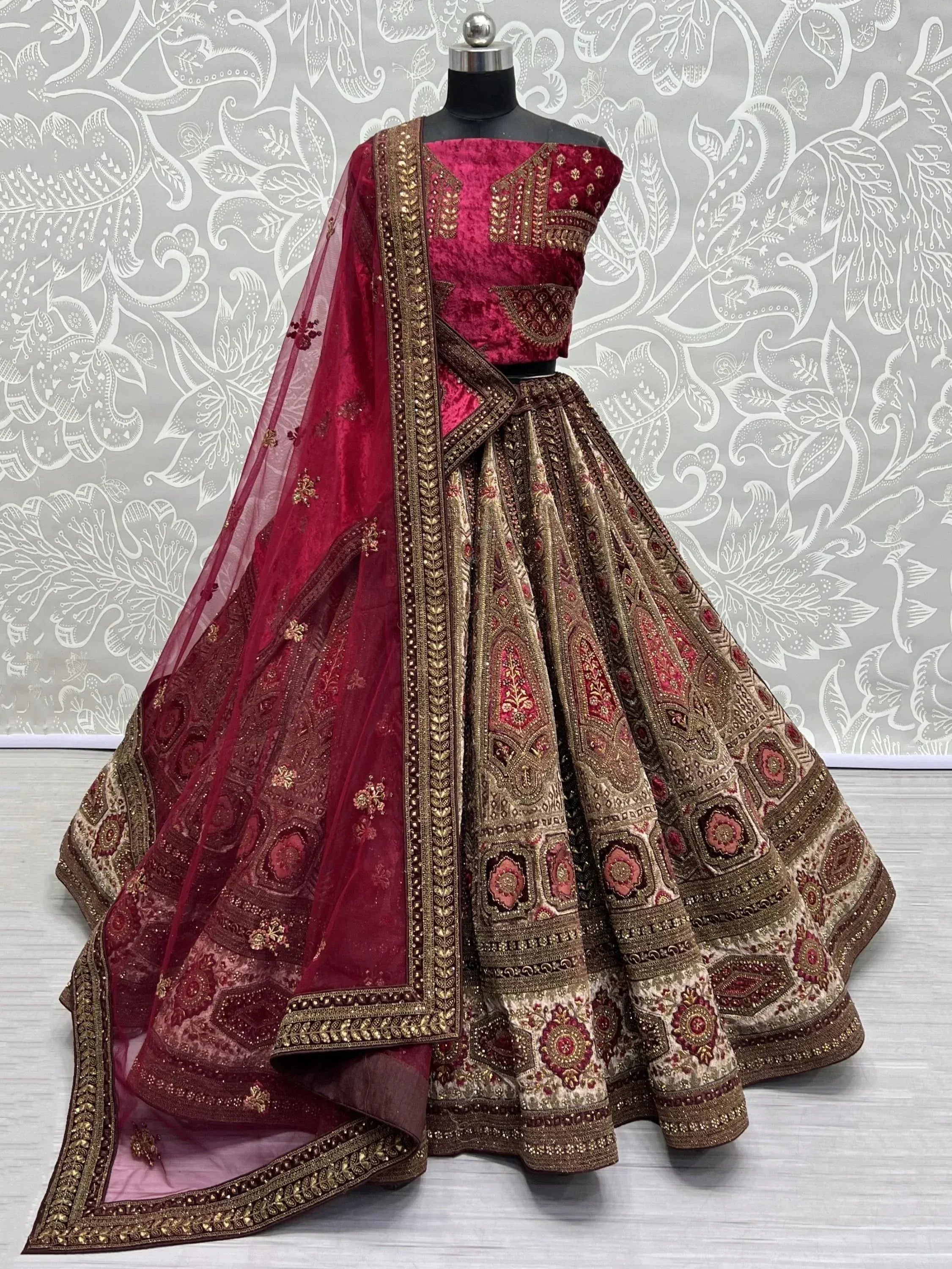 Maroon velvet designer lehenga choli with gold embroidery and sheer dupatta, Indian ethnic wear