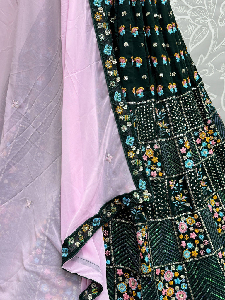 Dark green embroidered lehenga with floral motifs and pink dupatta, Indian ethnic wear