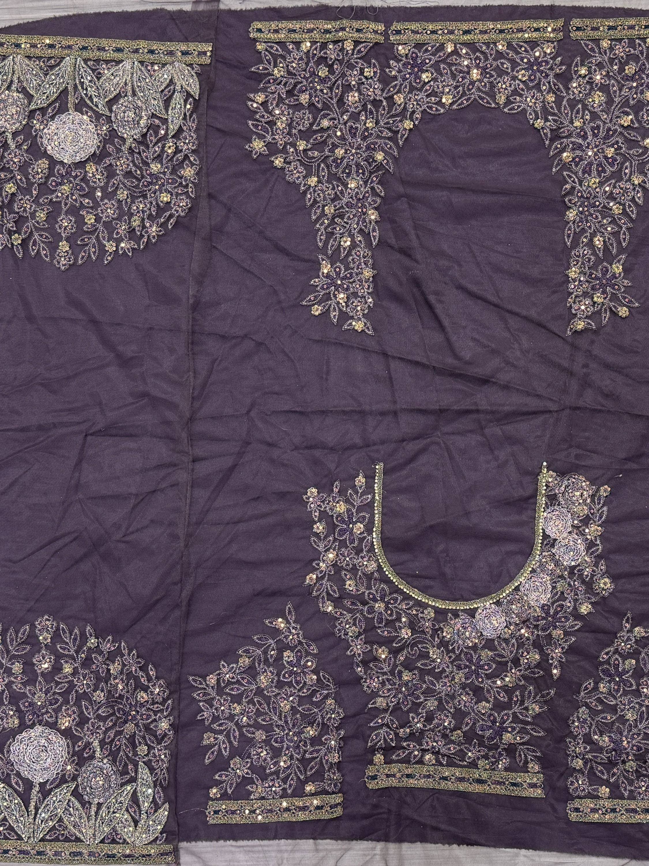 Purple designer lehenga choli fabric with intricate floral embroidery and gold sequin detailing