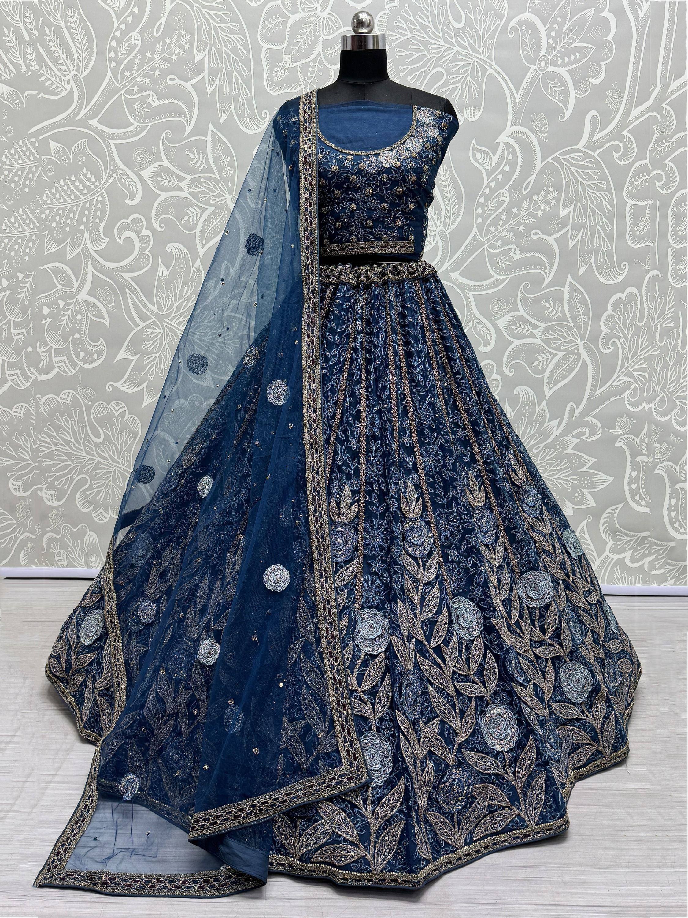 Elegant navy blue designer lehenga choli with gold floral embroidery and sheer dupatta