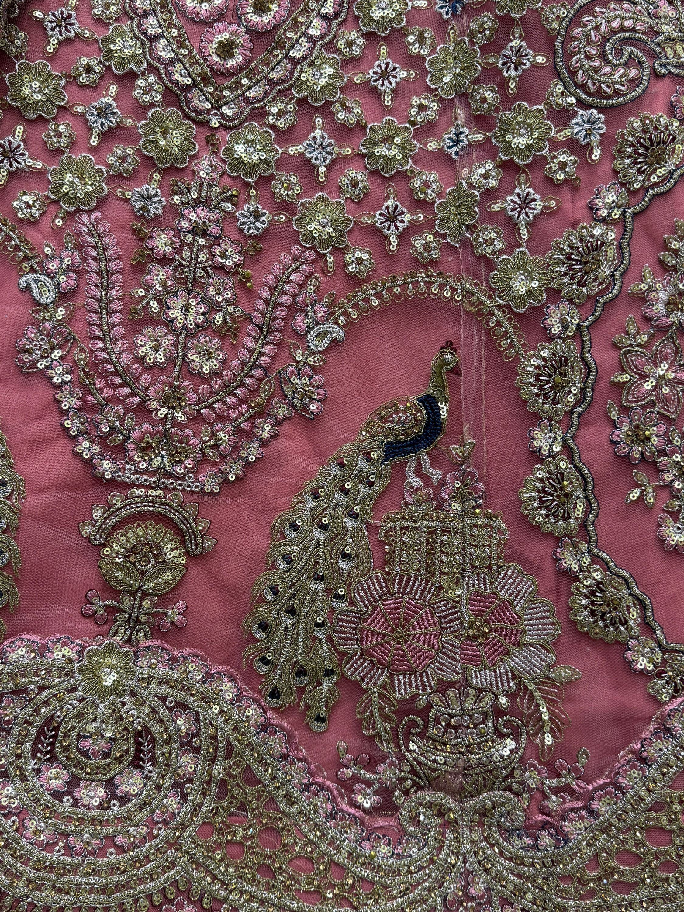 Enchanting Pink Sequins Net Engagement Wear Lehenga Choli