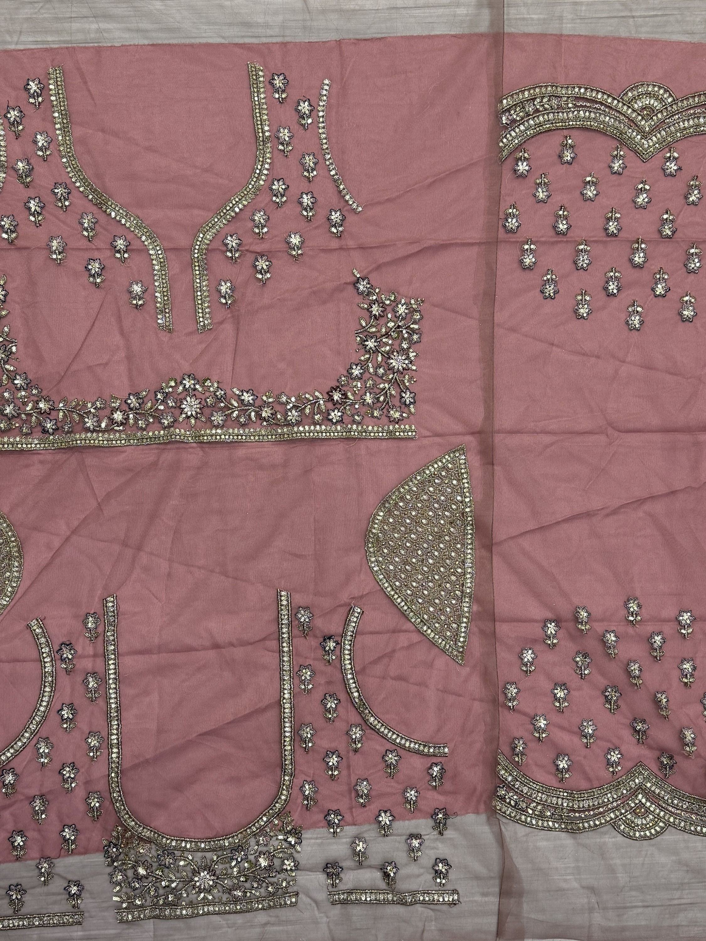 Enchanting Pink Sequins Net Engagement Wear Lehenga Choli