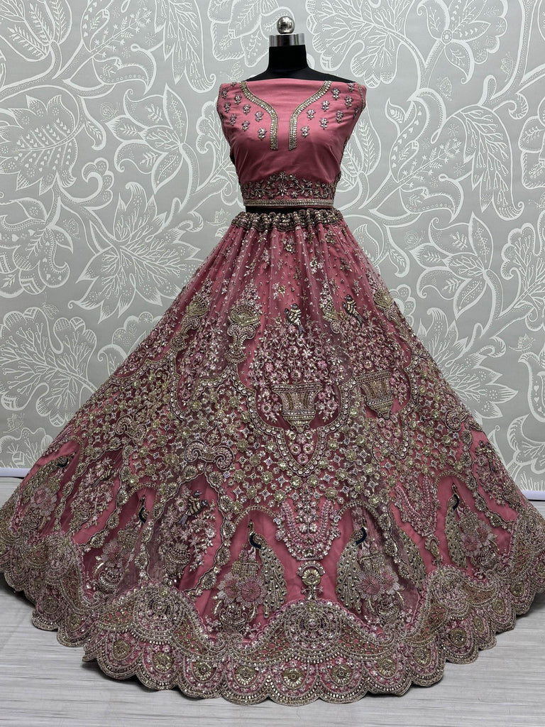 Enchanting Pink Sequins Net Engagement Wear Lehenga Choli