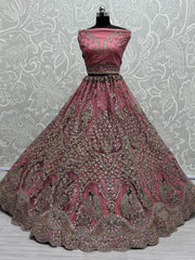 Enchanting Pink Sequins Net Engagement Wear Lehenga Choli