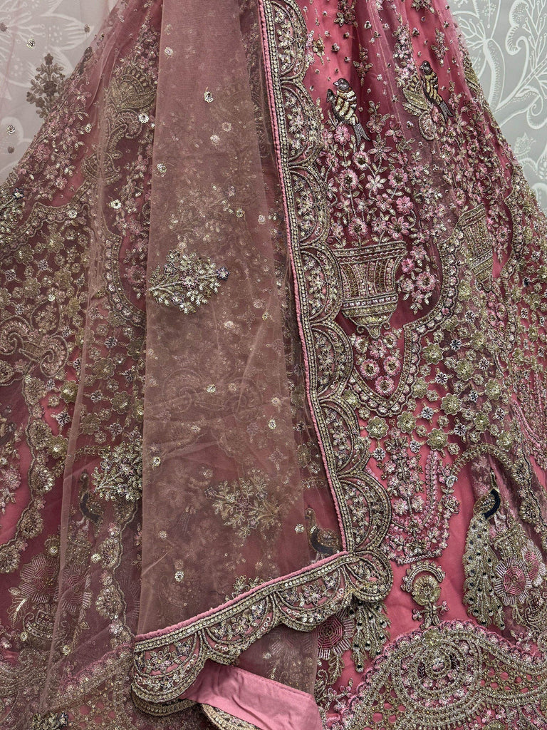 Enchanting Pink Sequins Net Engagement Wear Lehenga Choli