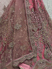Enchanting Pink Sequins Net Engagement Wear Lehenga Choli
