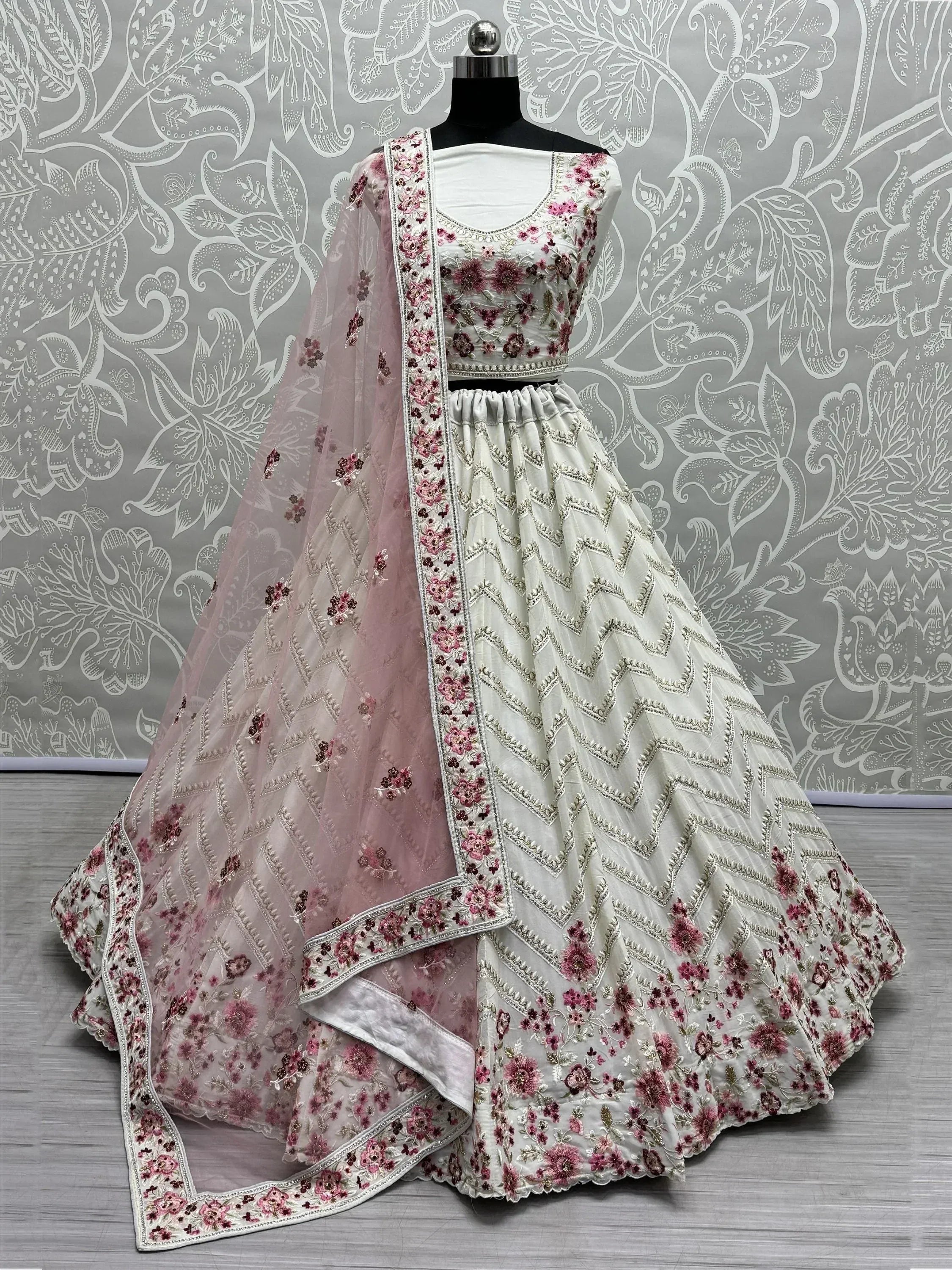 White floral embroidered lehenga choli with pink dupatta, ethnic Indian wear for weddings and festivals