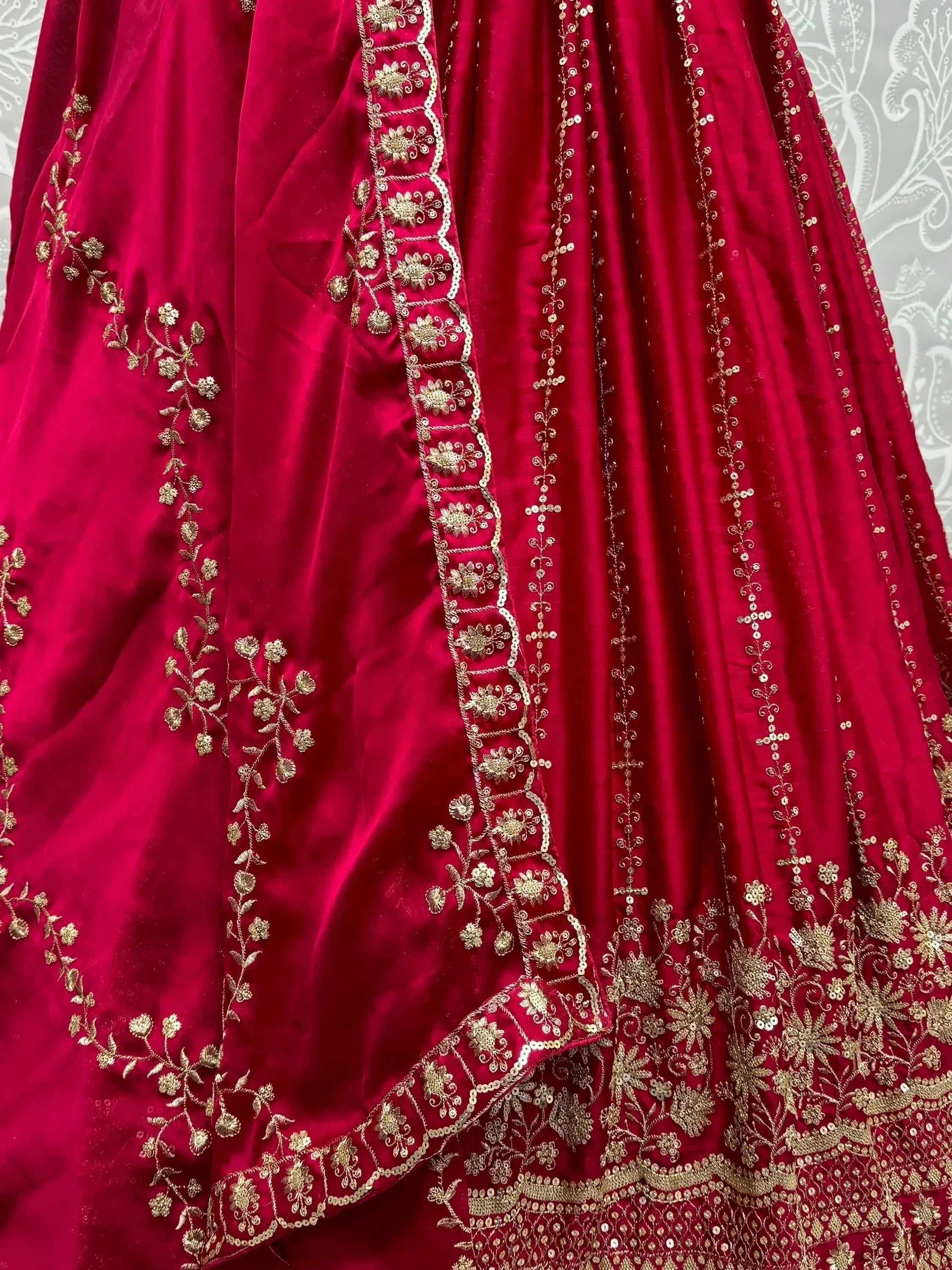 Red velvet lehenga with gold floral embroidery and sequin detailing