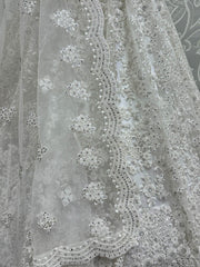 Gorgeous White Embroidered Net Reception Wear Lehenga Choli