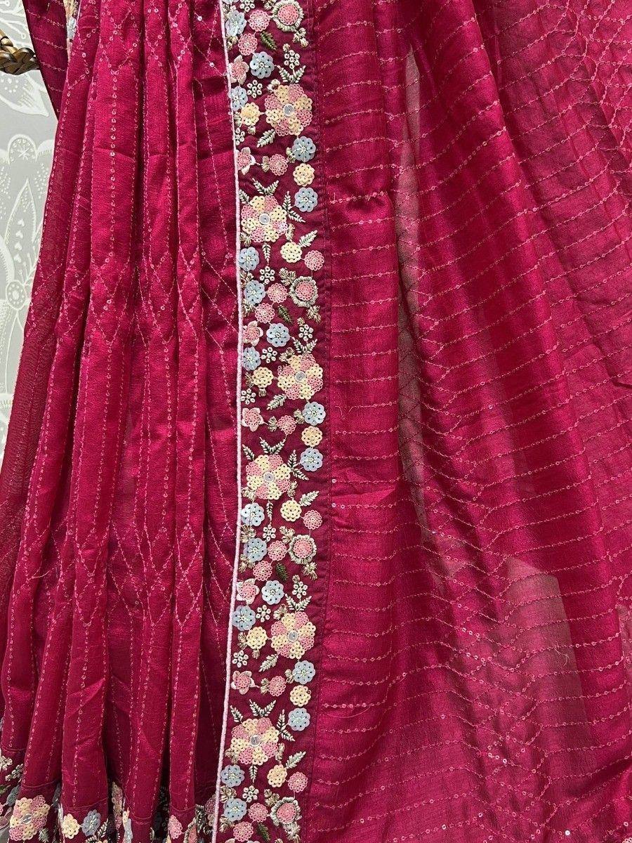 Pink ethnic gown with floral sequin embroidery and delicate threadwork detailing
