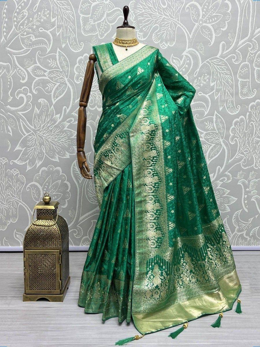 Emerald green designer saree with gold zari work, perfect for Indian ethnic wear occasions