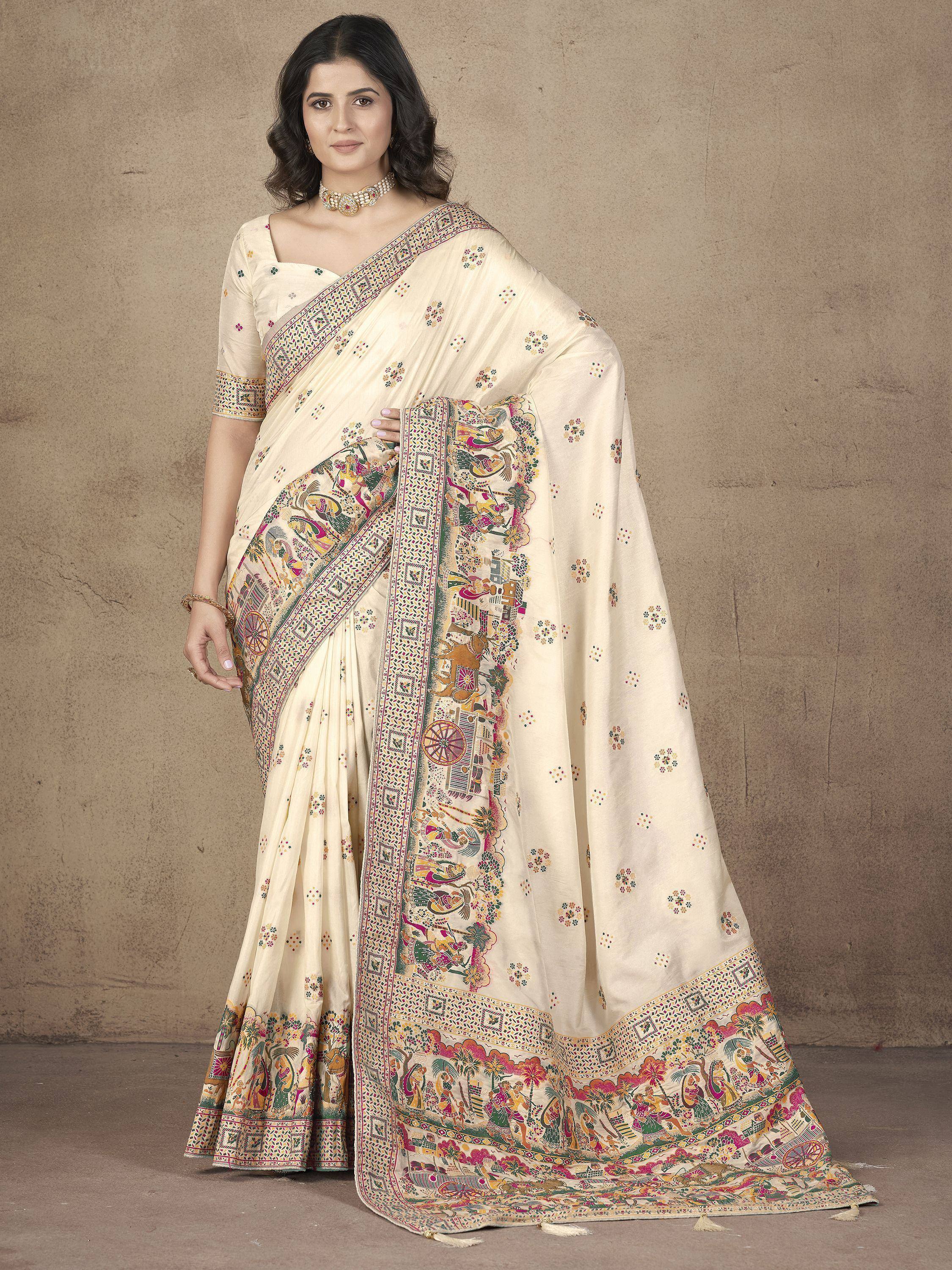 Cream saree with colorful folk art print, perfect for Indian ethnic wear occasions
