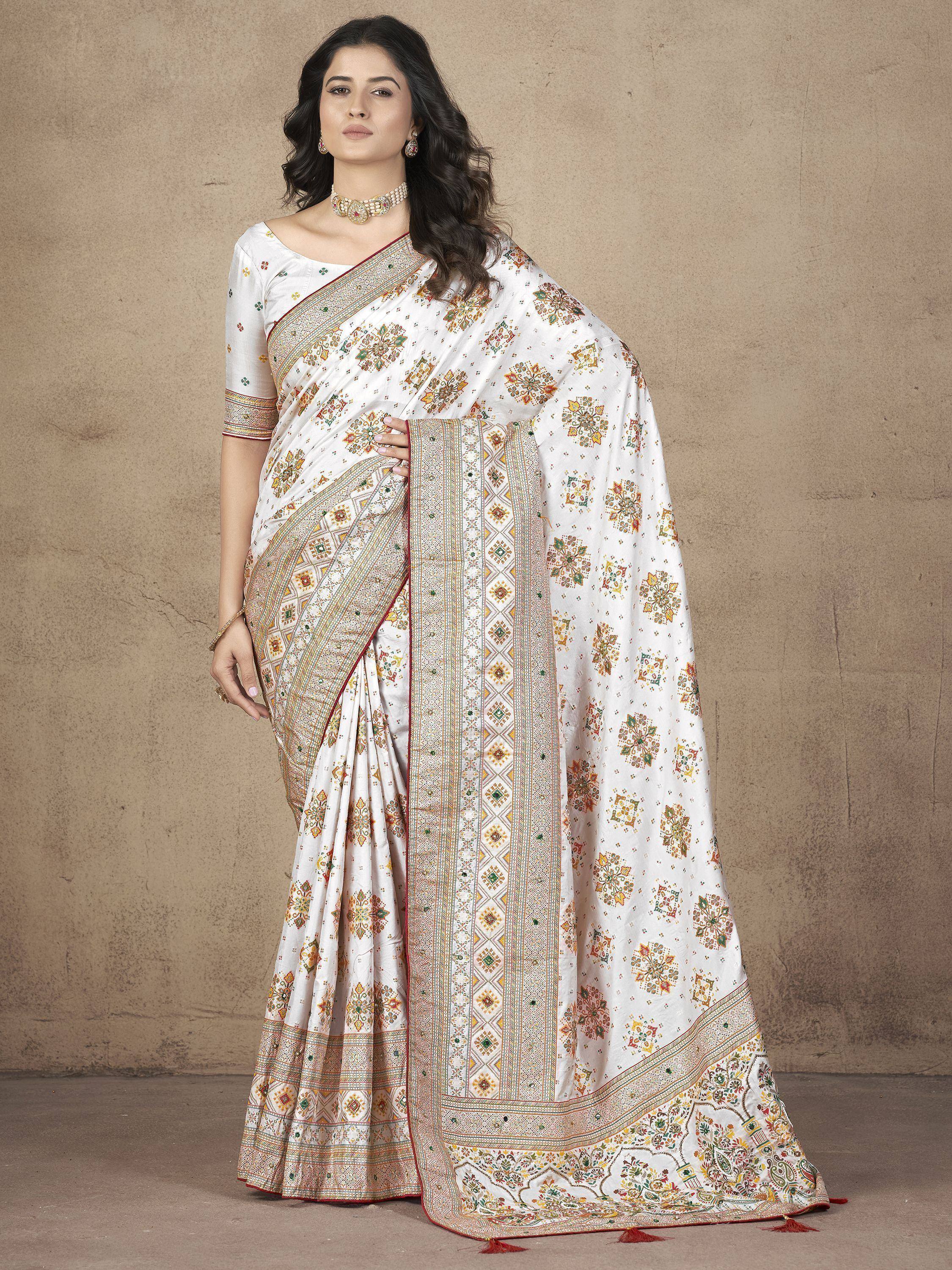 White floral printed saree with intricate border, perfect for Indian ethnic wear occasions