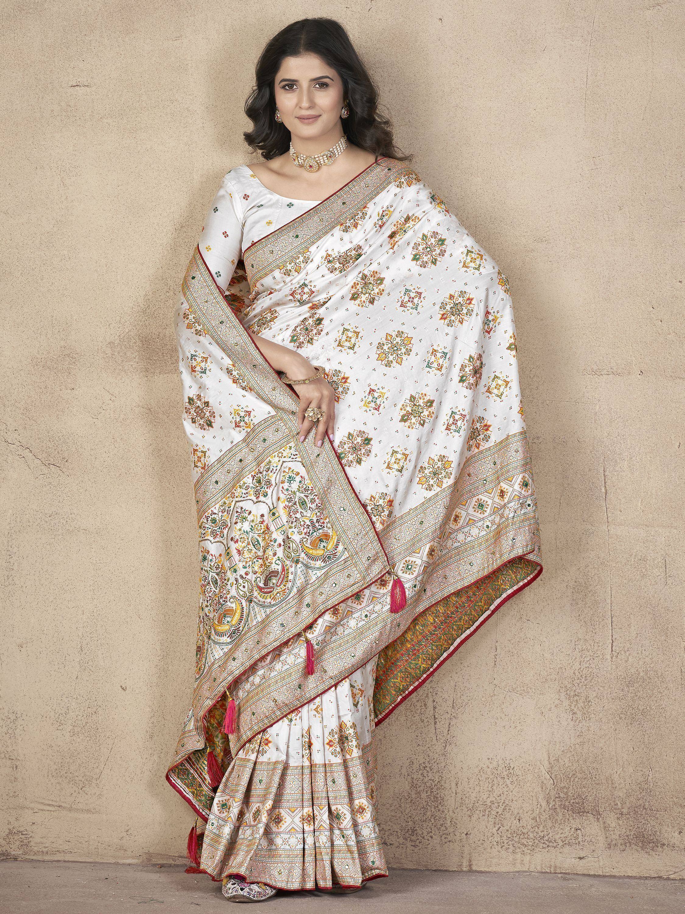 White printed saree with floral and paisley motifs, ethnic Indian wear for women