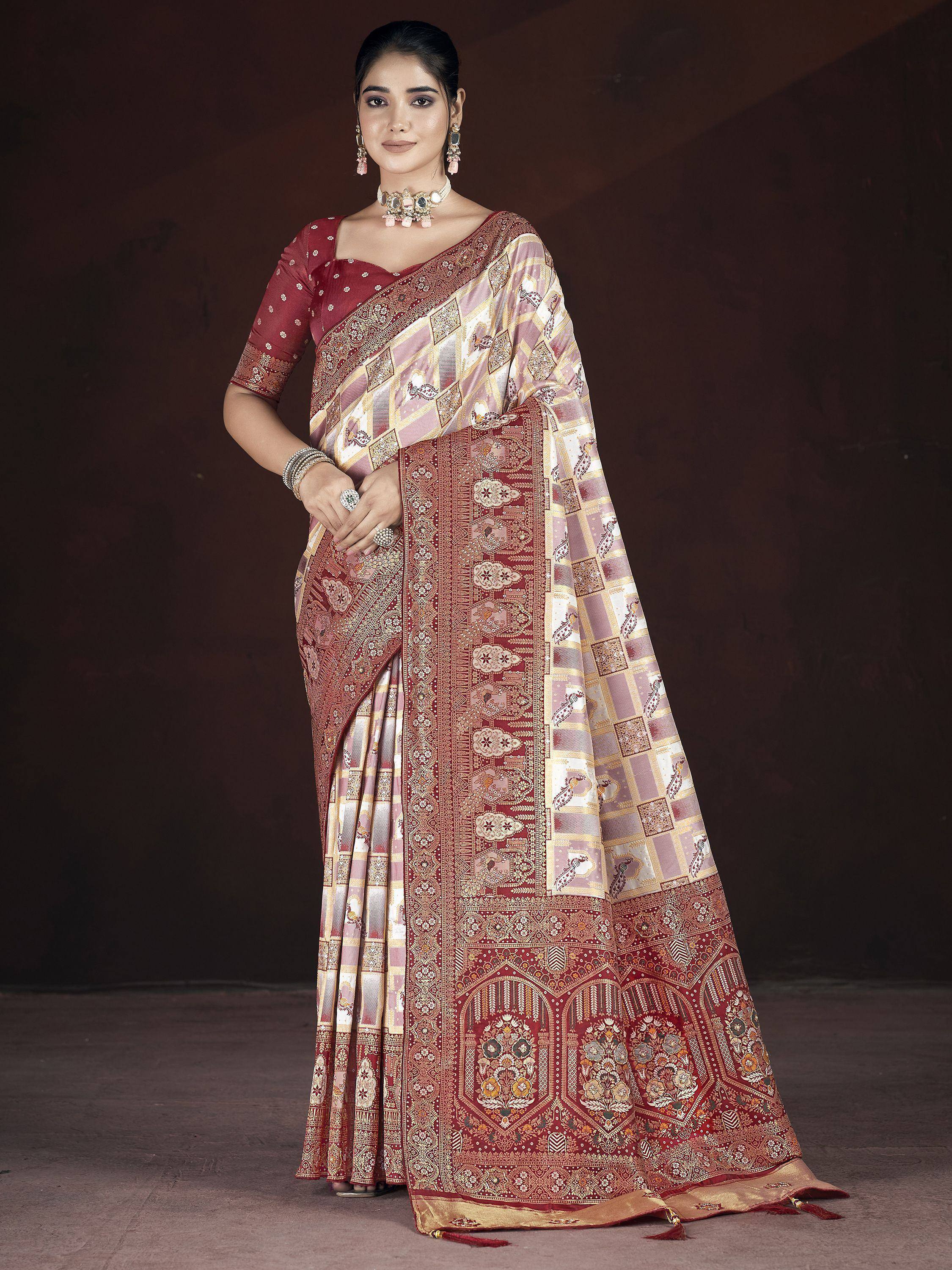 Elegant maroon and gold printed saree with intricate patterns, perfect for Indian ethnic wear occasions.