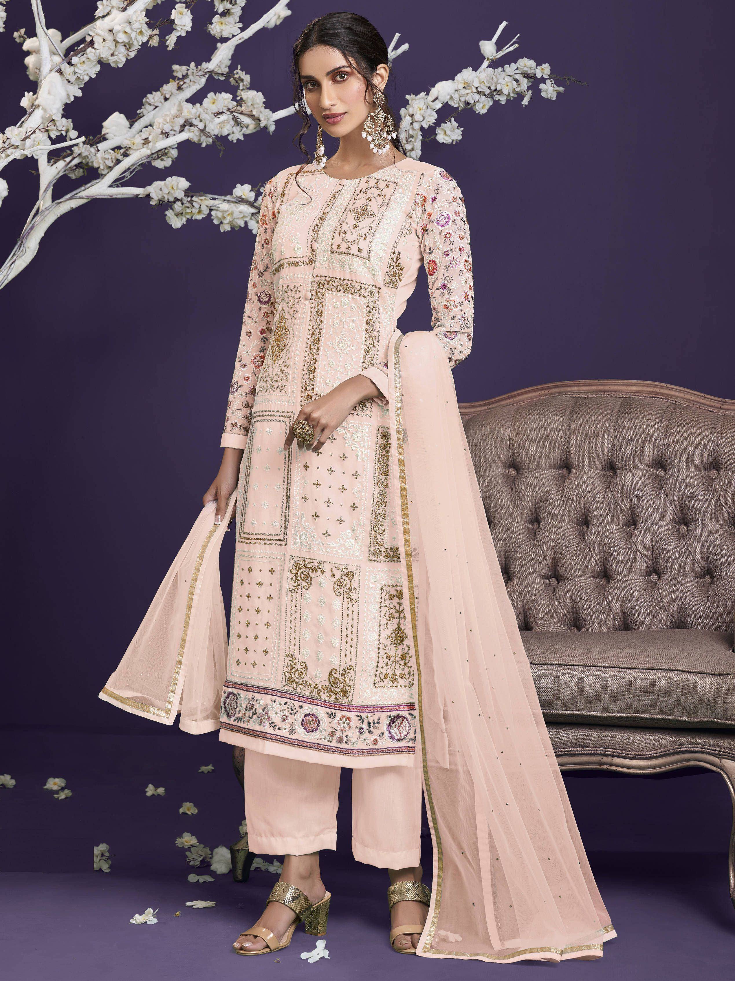 Woman in pastel pink embroidered salwar kameez with dupatta, floral backdrop, ethnic wear