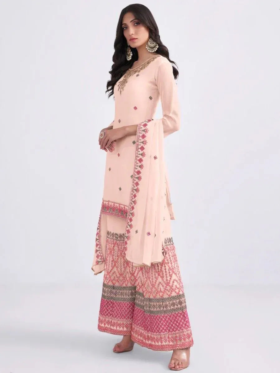 Elegant pink embroidered salwar kameez with intricate patterns and matching dupatta for ethnic wear