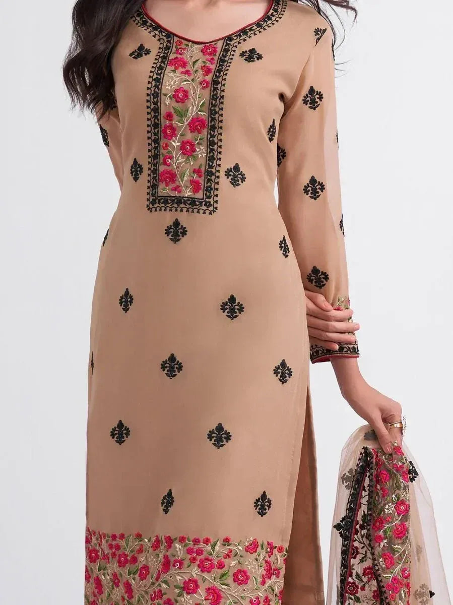 Beige embroidered kurti with pink floral design, black motifs, and matching dupatta for ethnic wear